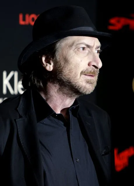 U.S. writer and film director Frank Miller arrives at a party for the upcoming release of his film "The Spirit", in central London, Thursday, Dec. 4, 2008. (AP Photo/Joel Ryan)